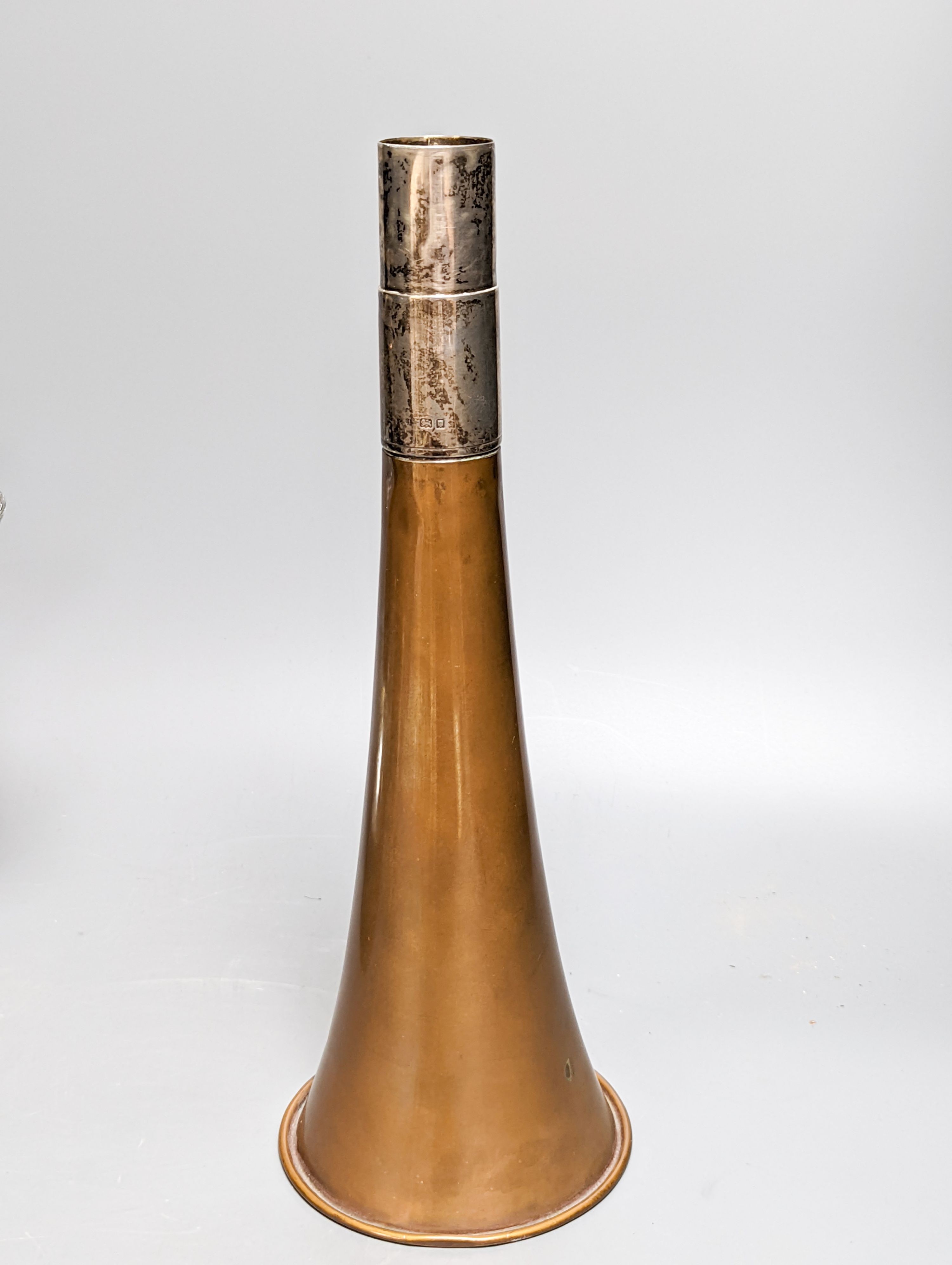 A copper plated silver base by Charles and Richard Comyns, London 1924, a large silver-mounted wine cooler and a glass jug